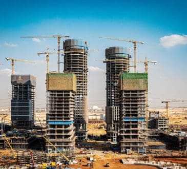 a group of tall buildings under construction