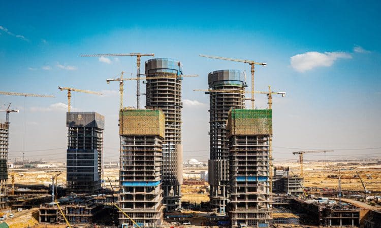 a group of tall buildings under construction